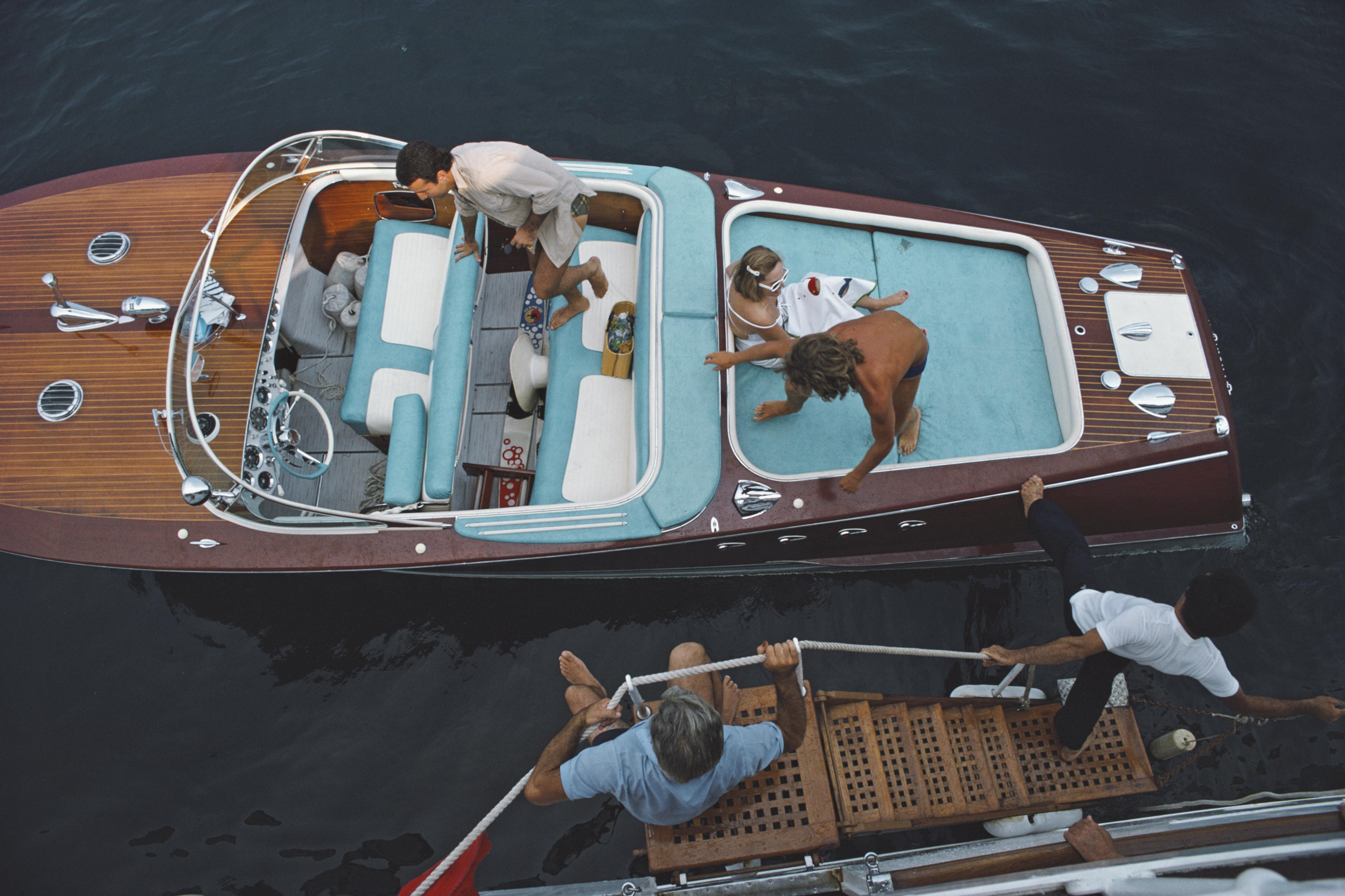 Slim Aarons
All Aboard
1975
C-print
Edition of 150

Friends board a riva boat in Monte Carlo, Monaco, 1975. (Photo by Slim Aarons/Hulton Archive/Getty Images)

Estate stamped and hand numbered edition of 150 with certificate of authenticity from the