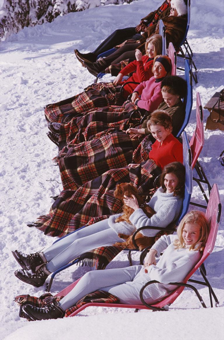 Apres Ski
1963 (printed later)
Chromogenic Lambda Print
Estate edition of 150

A group of women reclining on the snow in Gstaad with rugs covering their knees, 1963.

Estate stamped and hand numbered edition of 150 with certificate of authenticity
