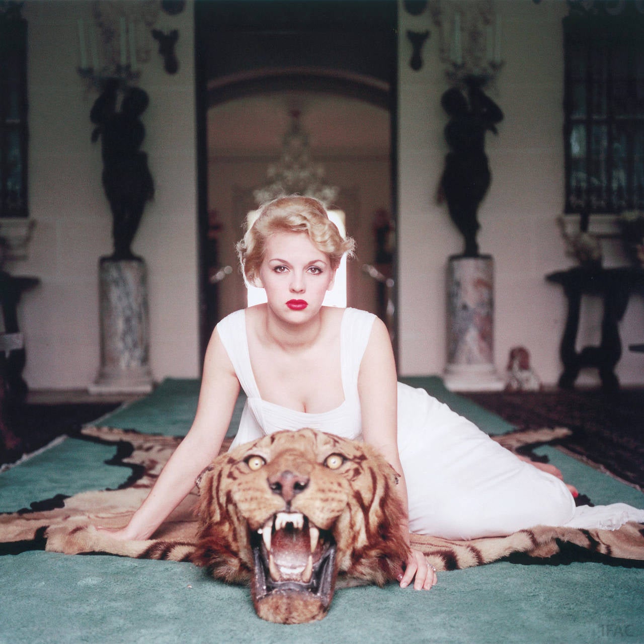 Lady Daphne Cameron (Mrs George Cameron) on a tiger skin rug in the trophy room at socialite Laddie Sanford's home in Palm Beach, Florida.

Estate stamped and hand numbered edition of 150 with certificate of authenticity from the estate. 

Slim