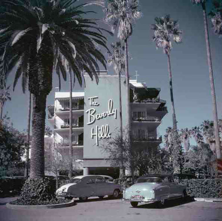 Cars parked outside the Beverly Hills Hotel on Sunset Boulevard in California, 1957. 

Slim Aarons worked mainly for society publications, taking pictures of the rich and famous both before and after serving as a photographer for the US military