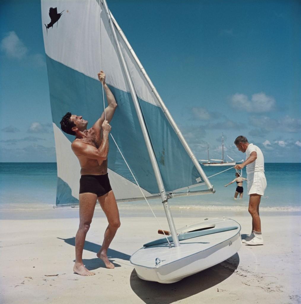 Slim Aarons - Boating in antigua - Estate Stamped

Limited Edition Estate Stamped Print (edition size 1/150).
 American actor Hugh O’Brian (left) hoists the sail on a dinghy, Antigua, West Indies, 1961.
In his words, he loved to photograph