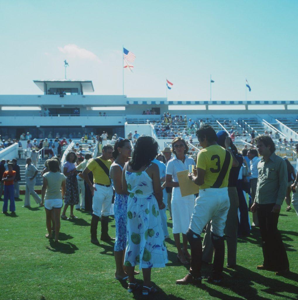 Slim Aarons - Boca Raton  Polo Set - Estate Stamped

 group of players and friends at a polo match at the Royal Palm Polo Club in Boca Raton, Florida, April 1978. (Photo by Slim Aarons)

This photograph epitomises the travel style and glamour of the