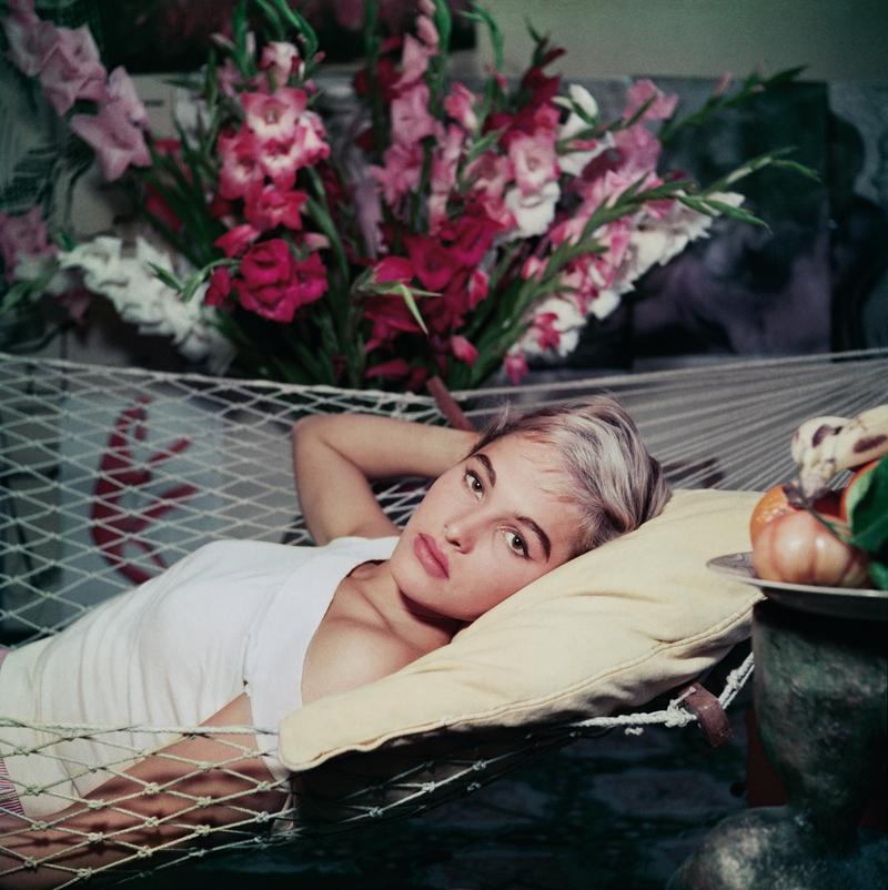 Bond Girl To Be 

Sultry sex symbol, film star Ursula Andress takes a siesta in a hammock on a visit to Rome, circa 1955. 

Gorgeous print measuring an large 40 x 40" inches / ca 101 x 101 cm’s.
 
Estate Stamped Collection Edition to 150 

Photo by