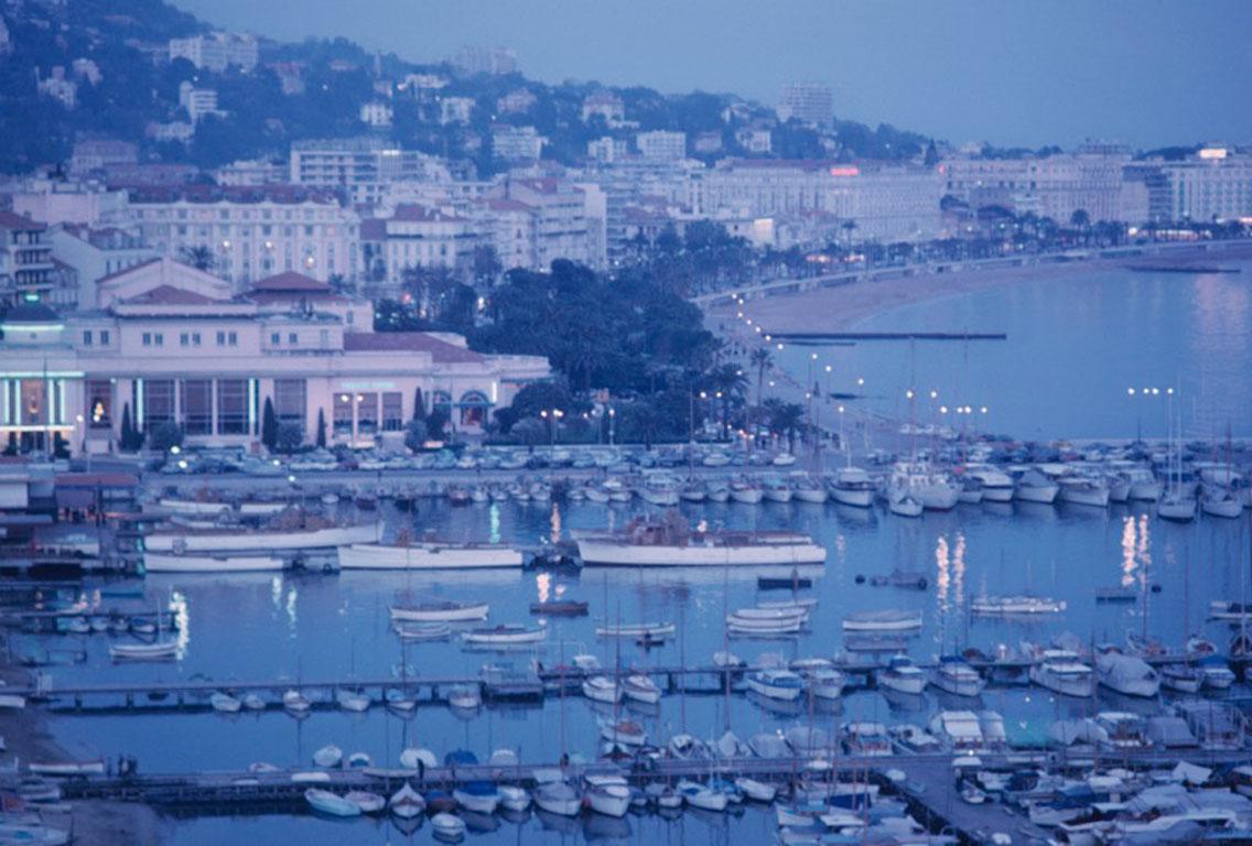 Cannes Harbor, 1963
Chromogenic Lambda Print
Estate edition of 150

The beach at Cannes, seen from the marina, March 1963.

Estate stamped and hand numbered edition of 150 with certificate of authenticity from the estate. 

Slim Aarons (1916-2006)
