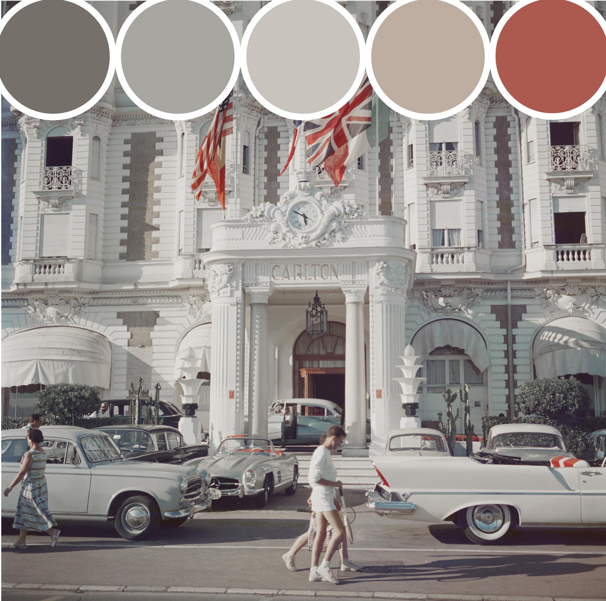 The entrance to the Carlton Hotel, Cannes, France, 1958. 

Slim Aarons
Carlton Hotel
Lambda Print
6 sizes available
Slim Aarons Estate Edition

60 x 60 inches
$5100

48 x 48 inches
$4500

40 x 40 inches
$3950

30 x 30 inches
$3350

20 x 20