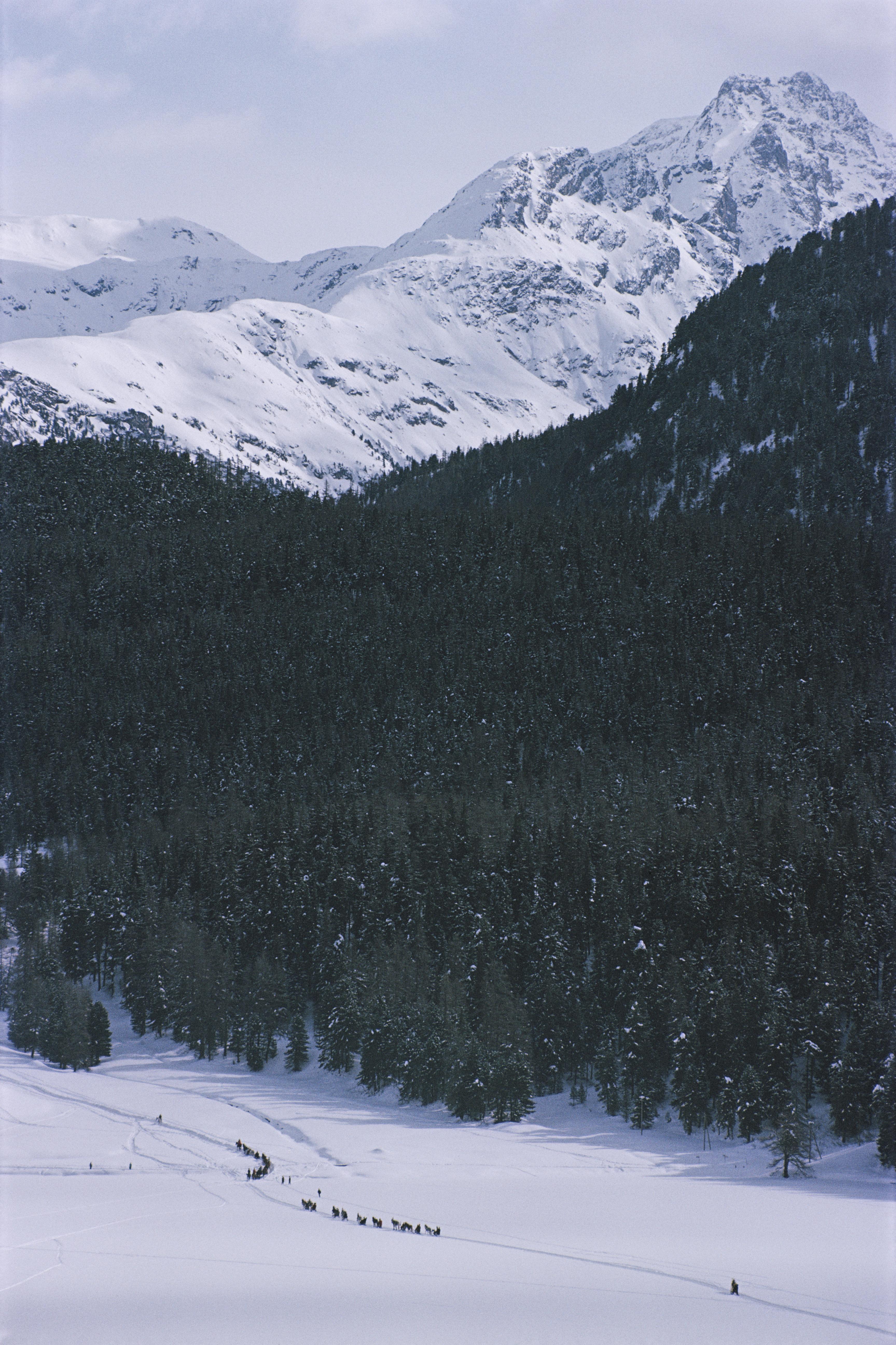 Slim Aarons, Crossing Snow Field