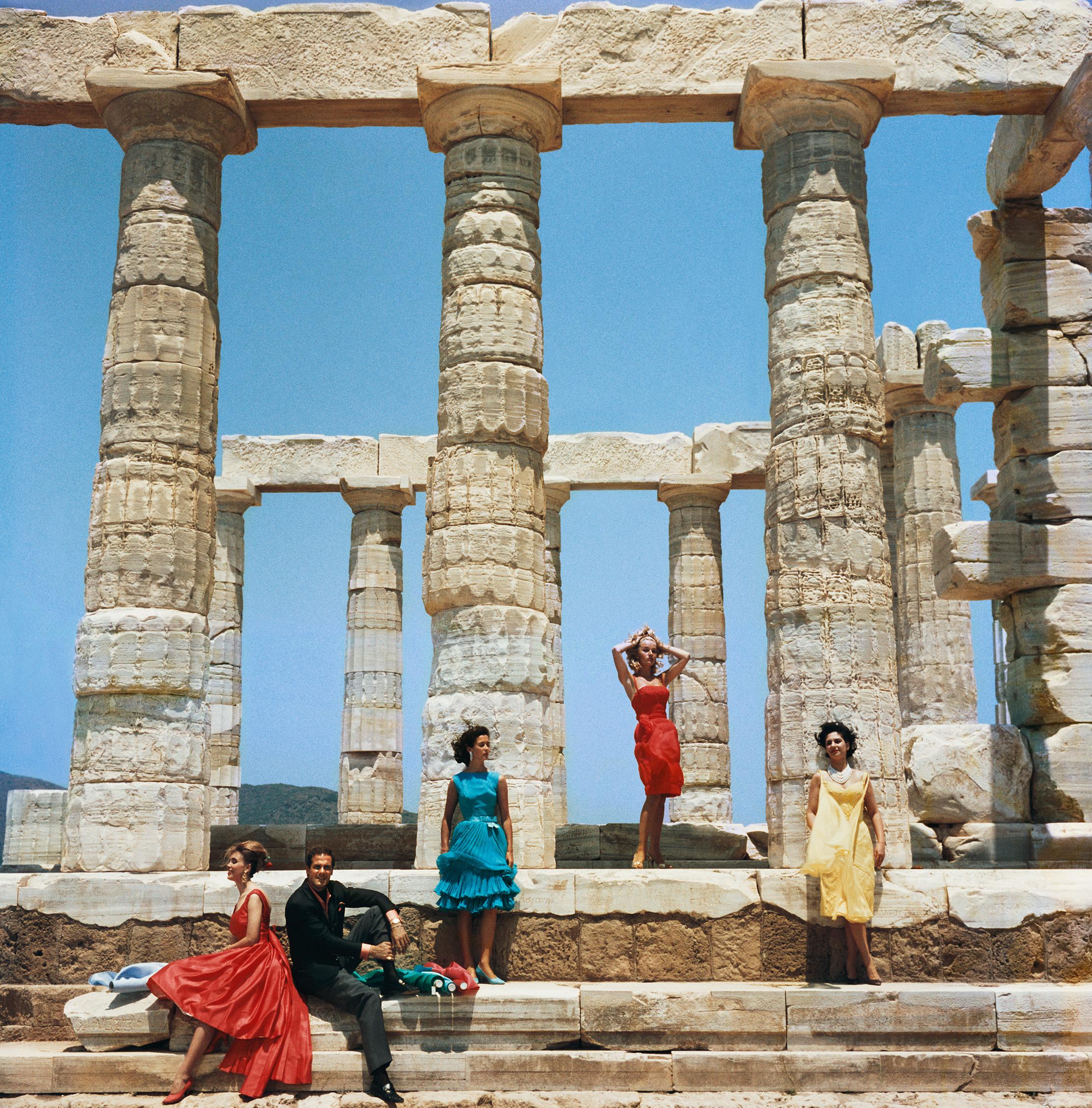 Slim Aarons
Dimitris Kritsas with Models at Sounio
1968
C print
Estate stamped and hand numbered edition of 150 with certificate of authenticity from the estate. 

Dimitris Kritsas, a fashionable young couturier, poses among the gleaming Doric