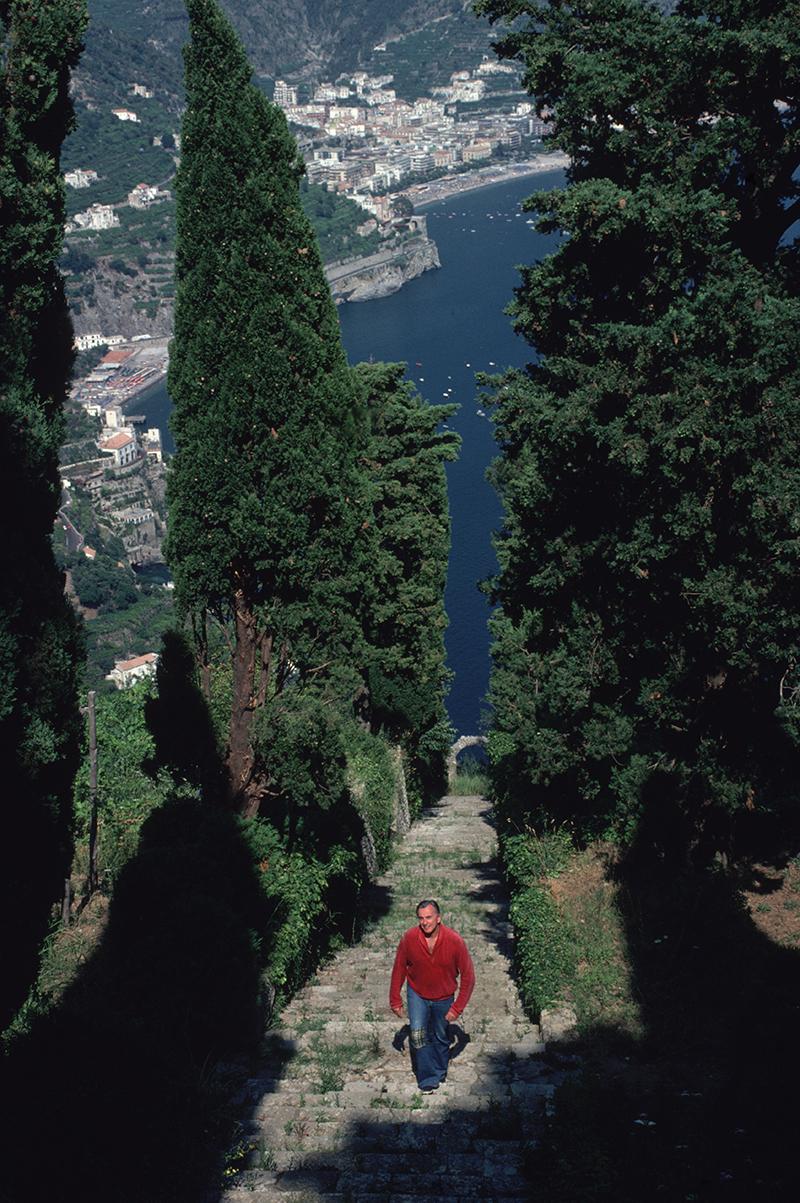 Slim Aarons Estate Stamped Edition 
Limited to 150 only 

Writer Gore Vidal climbing steep steps on a hillside at Positano with the sea in the background, Italy, 1979. (Photo by Slim Aarons)

This photograph epitomises the travel style and glamour
