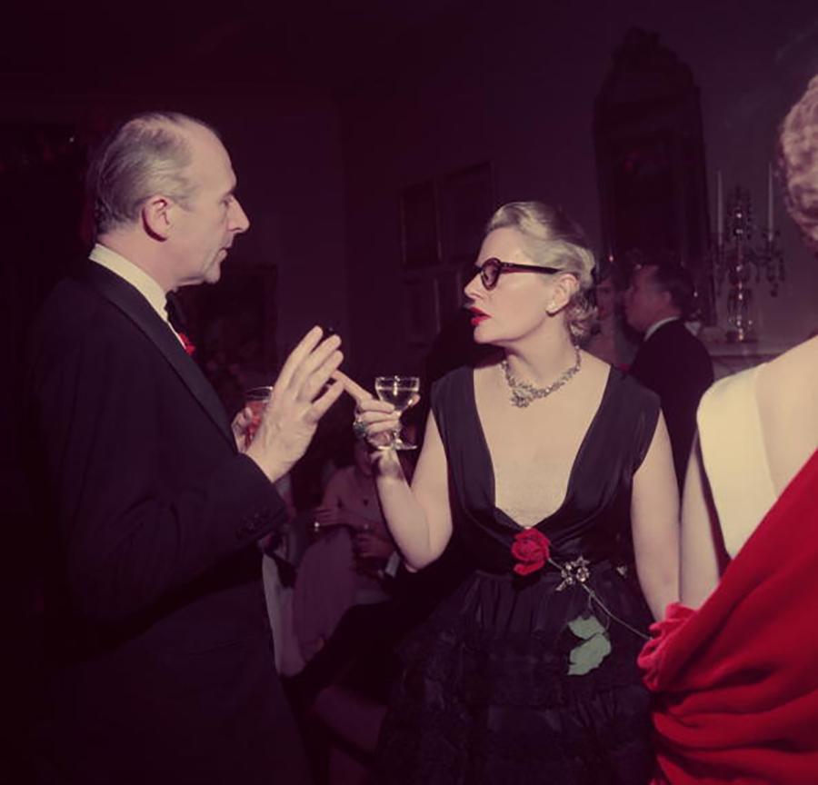 Slim Aarons Estate Stamped Edition 
Limited to 150 only 

Fleur Cowles talks to photographer and designer Cecil Beaton (1904 - 1980) at a New Years party, on New Yorks Park Avenue, 1952 (Photo by Slim Aarons). 


This photograph epitomises the