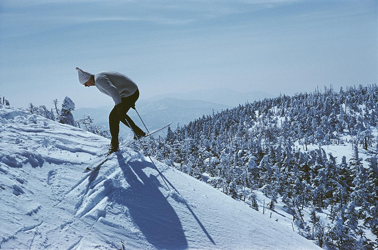 Slim Aarons Estate Stamped Edition 
Limited to 150 only 

Skiing at Sugarbush, a mountain resort in Vermont, April 1960. (Photo by Slim Aarons)

This photograph epitomises the travel style and glamour of the period's wealthy and famous, beautifully