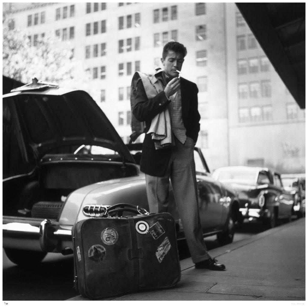 Limited Edition Estate Stamped Print (edition size 1/150).

Film star Farley Granger (Farley Earle II) lights up outside the Plaza Hotel, New York, circa 1955.

This photograph epitomises the travel style and glamour of the period's wealthy and
