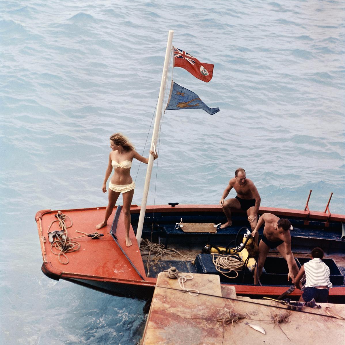 Slim Aarons Estate Print  - Andros Island 

Friends prepare for a day snorkelling by Andros Island, Bahamas, 1957. 
(Photo by Slim Aarons/Getty Images Archive London England)

Slim Aarons Chromogenic C print 
Printed Later 
Slim Aarons Estate