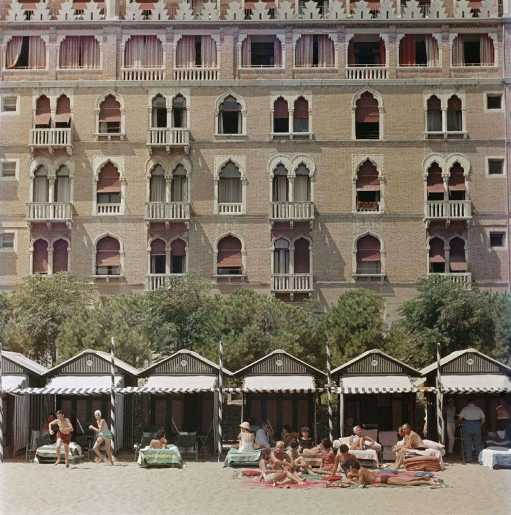 Hotel Excelsior

The beach front of the luxurious Excelsior Hotel on the Venice Lido, 1957.
Printed 2022.

Slim Aarons Chromogenic C print 
Printed Later 
Slim Aarons Estate Edition 
Produced utilising the only original transparency or negative held