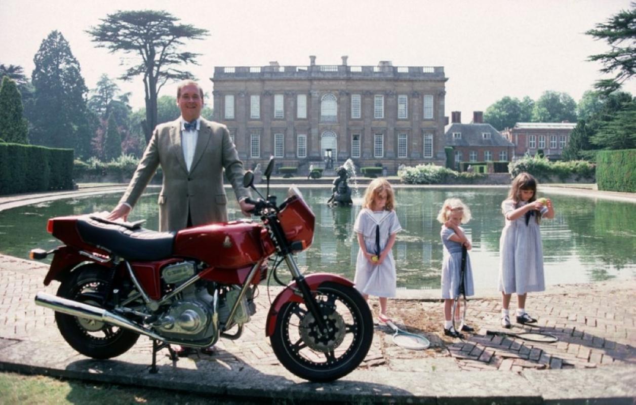 Motorcycling Lord

Lord Hesketh, Minister of State at the Department of Trade and Industry, by the lake in the grounds of his family estate Easton Neston House, Northamptonshire with his motorbike, a Hesketh V1000. The child in the centre is his