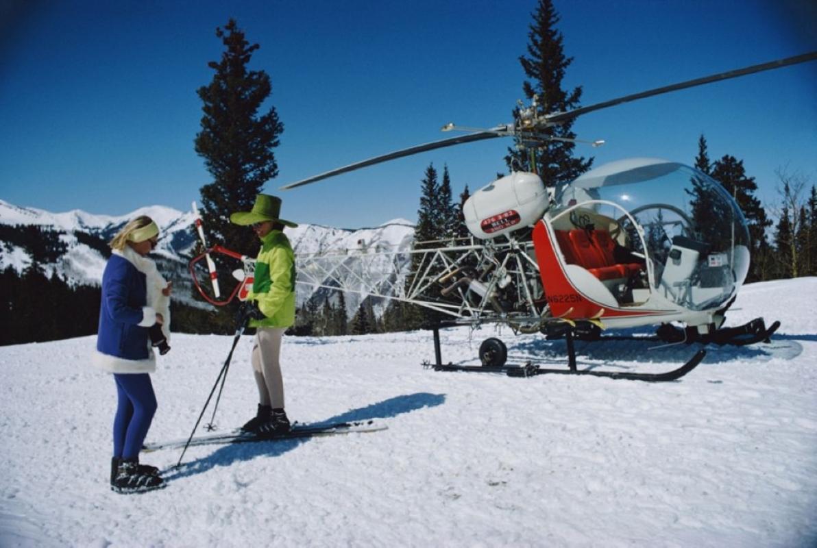 Slim Aarons Estate Print - Snowmass Village

Two fashionably attired women stand in the foreground of a snowy landscape with a helicopter on the slopes of Snowmass Village, in Pitkin County, Colorado, in March 1968


Slim Aarons Chromogenic C print
