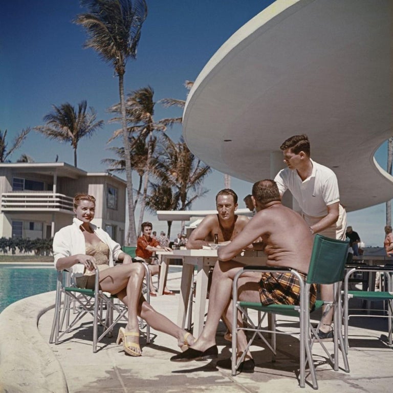 Slim Aarons - Esther Williams In Florida - Estate Stamped 

Limited Edition Estate Stamped Print (edition size 1/150). American swimmer and actress Esther Williams by the pool with friends in Florida, 1955.

This photograph epitomises the travel