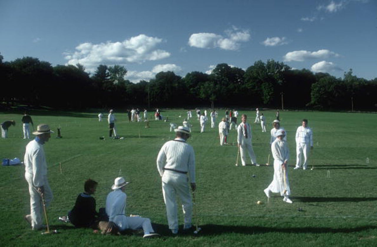 Players in the Fairfield County Hunt Club's croquet tournament, Fairfield, New England.

Slim Aarons
Fairfield Croquet
Chromogenic Lambda print
Slim Aarons Estate Edition

40 x 60 inches
$3950

30 x 40 inches
$3350

20 x 30