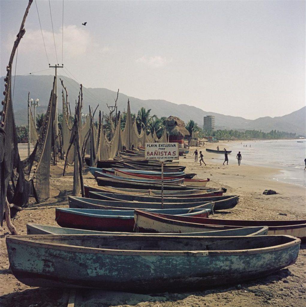 Fishing Boats 1952 Slim Aarons 

Limited Edition Estate Stamped Print

Fishing nets and boats on the shore in Mexico, 1952.

Produced from the original transparency
Certificate of authenticity supplied 
Archive stamped and numbered in ink on the
