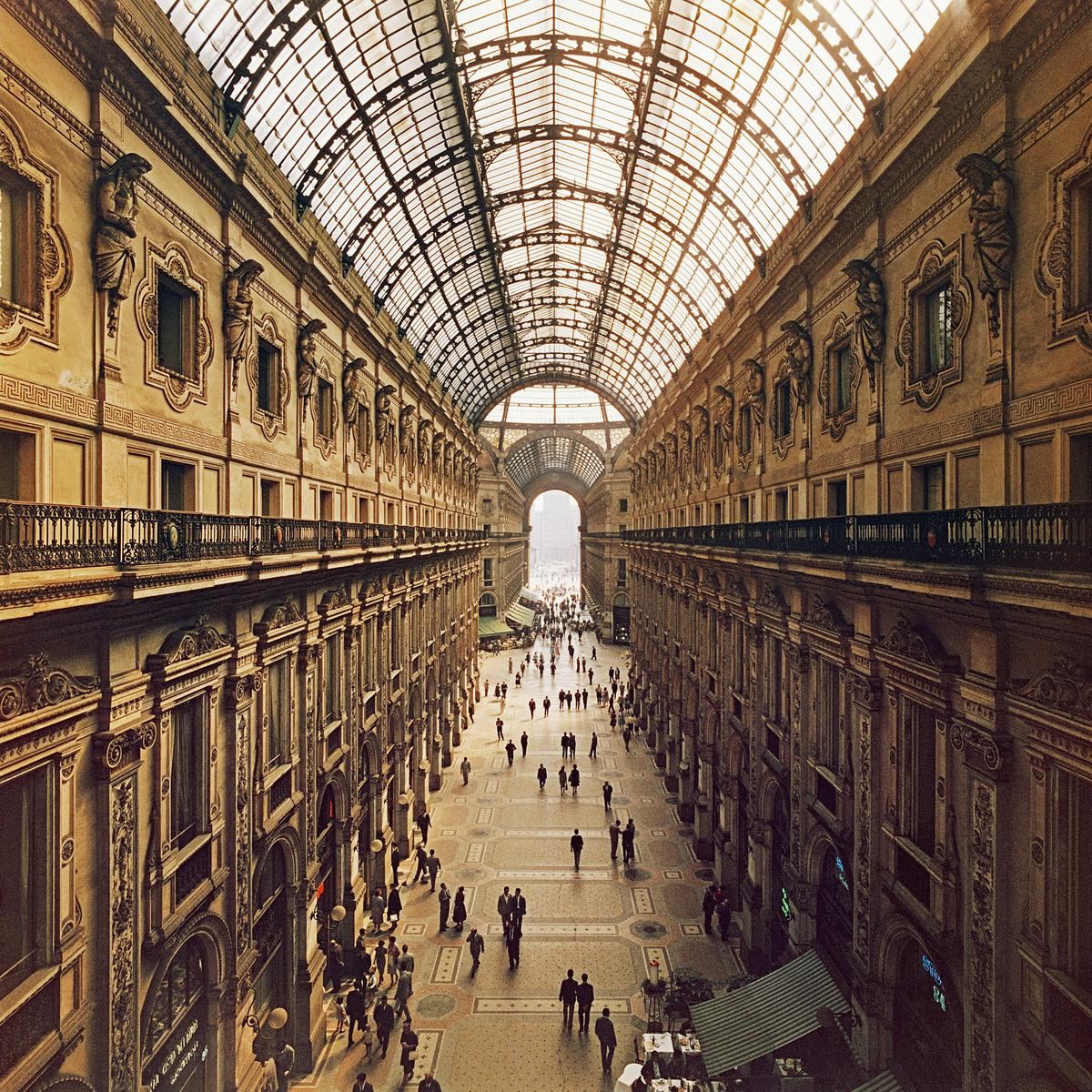 'Galleria Vittorio Emanuele II' 1960 - Slim Aarons Limited Edition Estate Stamped
View looking down the Galleria Vittorio Emanuele II in Milan, Italy, 1960. Opened in 1890, the covered arcade is on the northern side of the Piazza del