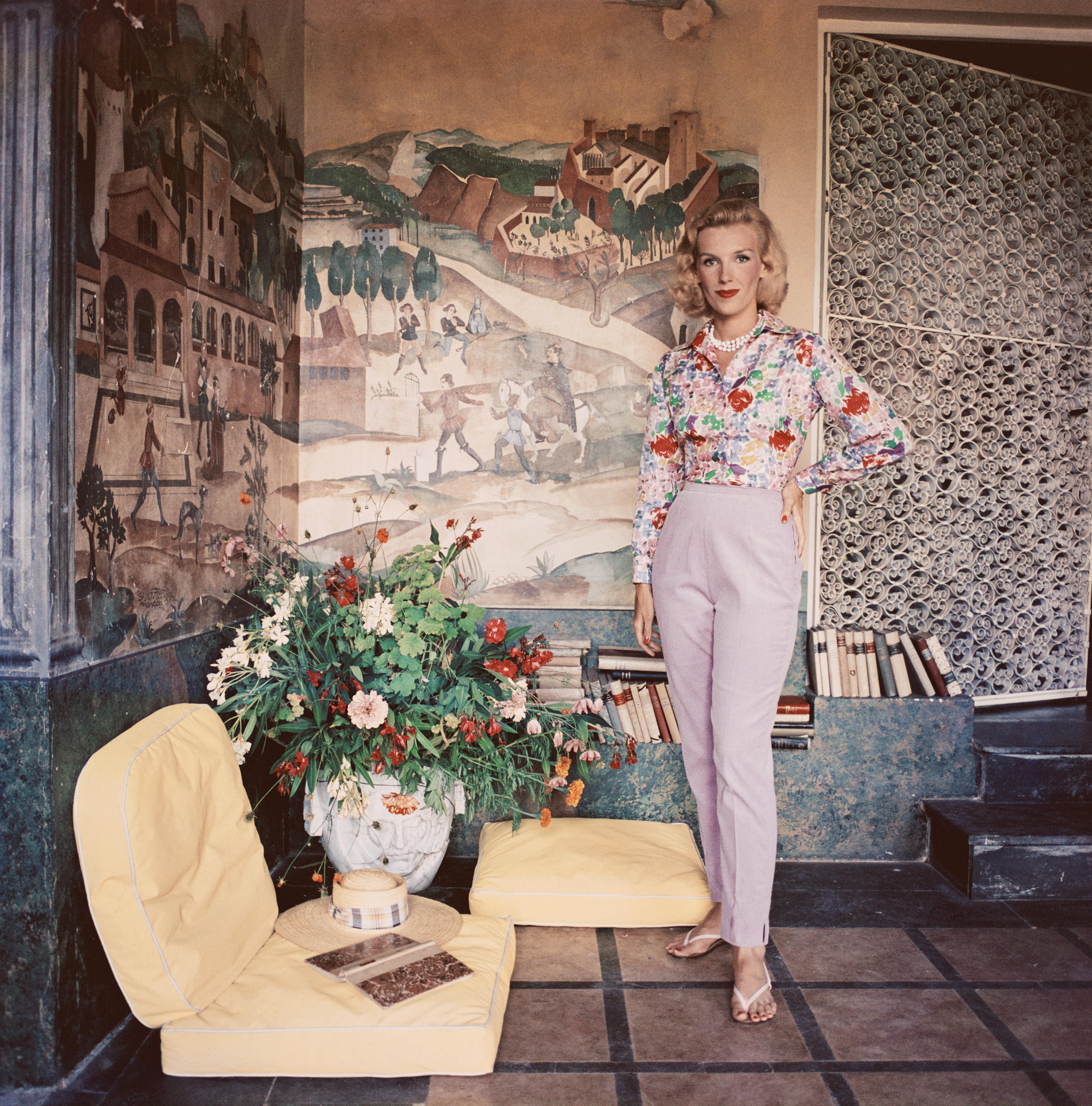 Harriet De Rosiere in Cannes
1958
C print
Estate stamped and hand numbered edition of 150 with certificate of authenticity from the estate. 

CAPTION: Viscountess Harriet de Rosiere at Mougins, near Cannes in France, 1957. (Photo by Slim