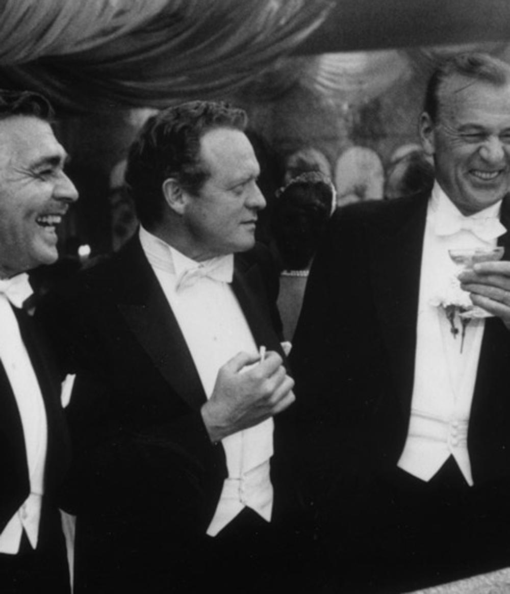 Kings of Hollywood (Clark Gable, Gary Cooper, James Stewart, Van Heflin - Black Portrait Photograph by Slim Aarons