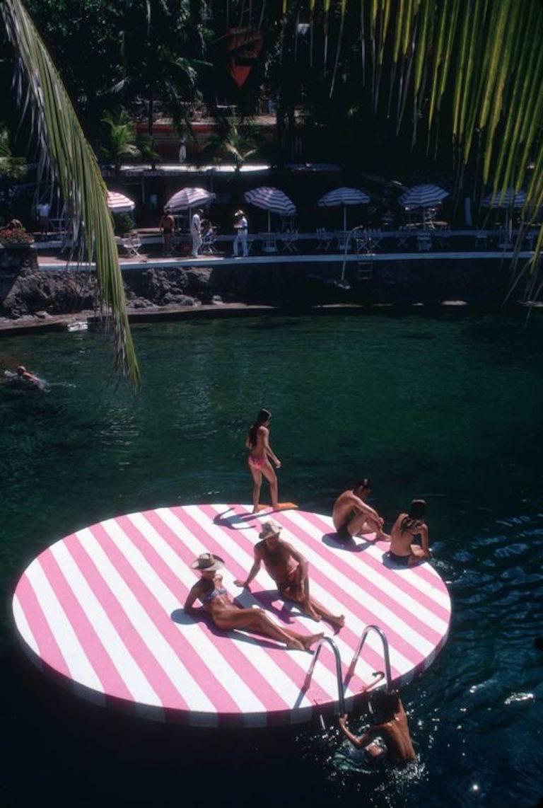 'La Concha Beach Club' 1975 Slim Aarons Limited Estate Edition
Bathers at La Concha Beach Club, Acapulco, Mexico, February 1975.

Slim Aarons Chromogenic C print 
Printed Later 
Slim Aarons Estate Edition 
Produced utilising the only original
