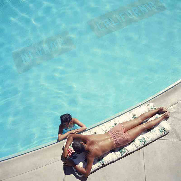 Slim Aarons
Lake Tahoe Couple 
1959
C print
Estate stamped and hand numbered edition of 150 with certificate of authenticity from the estate.  

A couple at a swimming pool at the Cal Neva Lodge on the shore of Lake Tahoe, USA, 1959. The Cal Neva