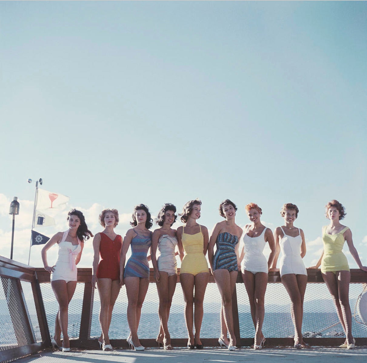 A group of young women in their bathing suits on the Nevada side of Lake Tahoe, 1959. 

Slim Aarons worked mainly for society publications, taking pictures of the rich and famous both before and after serving as a photographer for the US military