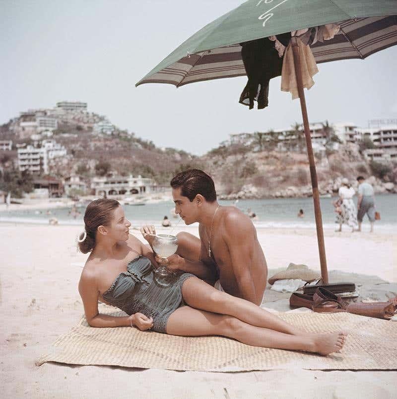 Model Friend, 1952
Chromogenic Lambda Print
Estate edition of 150

New York model, Jean Adams and friend share a drink on the beach at Acapulco, 1952

Estate stamped and hand numbered edition of 150 with certificate of authenticity from the estate.