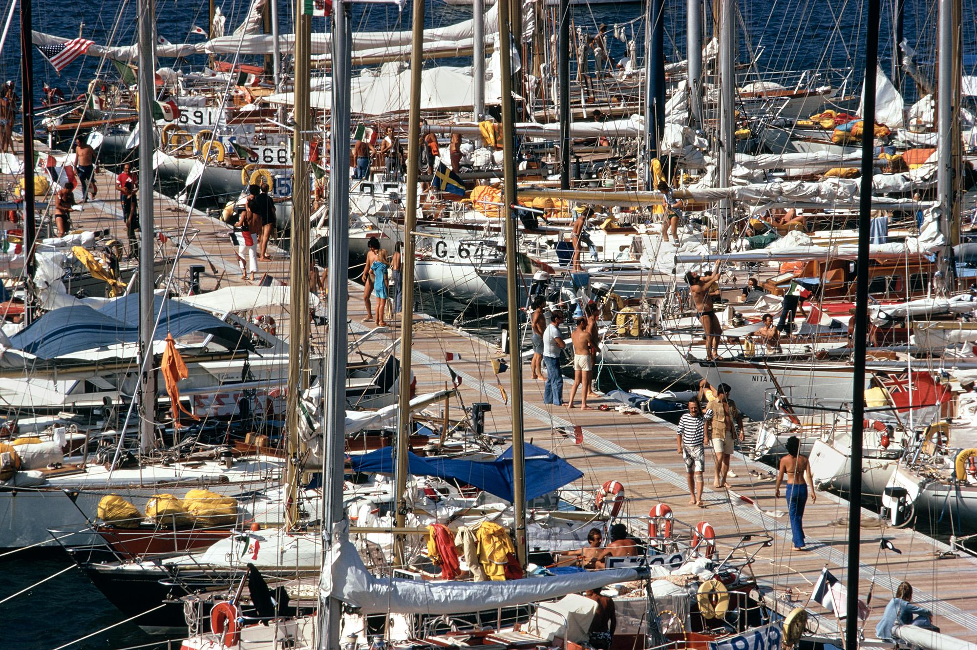 Slim Aarons
Porto Ercole Harbour
1980
C print
Estate stamped and hand numbered edition of 150 with certificate of authenticity from the estate.   

Yachts moored to a pontoon in Porto Ercole, Tuscany, 1980. 
(Photo by Slim Aarons/Hulton