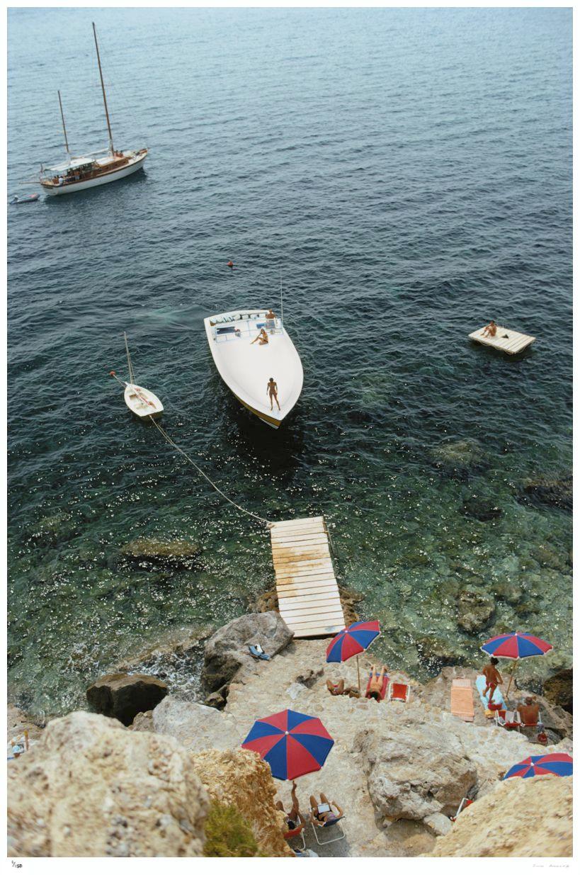 Porto Ercole

 A Magnum motorboat belonging to Count Filippo Theodoli arrives at the private jetty of the Il Pellicano Hotel in Porto Ercole, Italy, August 1973.

(Photo by Slim Aarons)

Unframed (Premium Collection) Limited Edition Estate Stamped