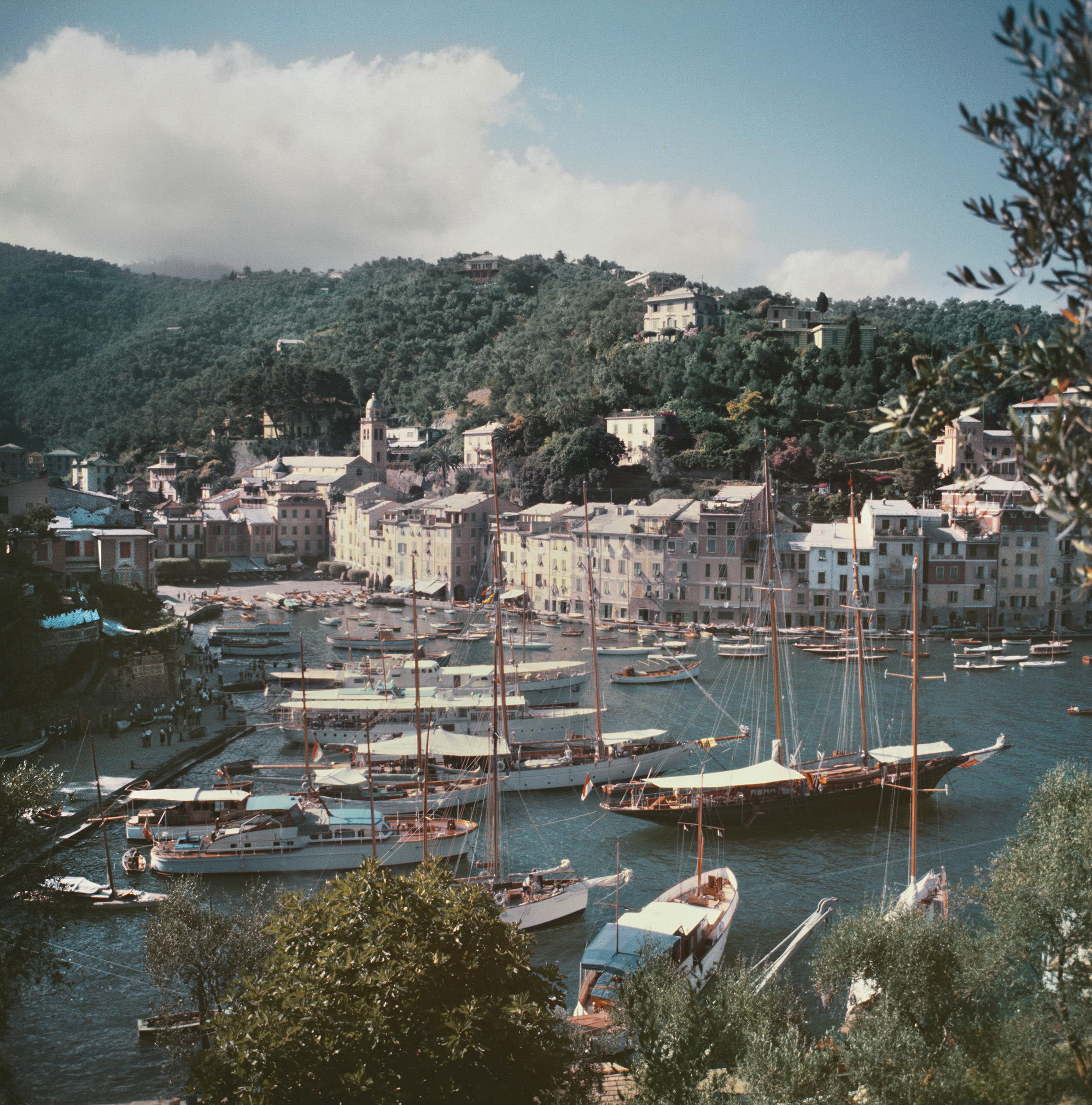 Portofino
1955
C print
Estate stamped and hand numbered edition of 150 with certificate of authenticity from the estate.   

Yachts moored in the Italian fishing village of Portofino, circa 1955. (Photo by Slim Aarons/Getty Images)

Slim Aarons
