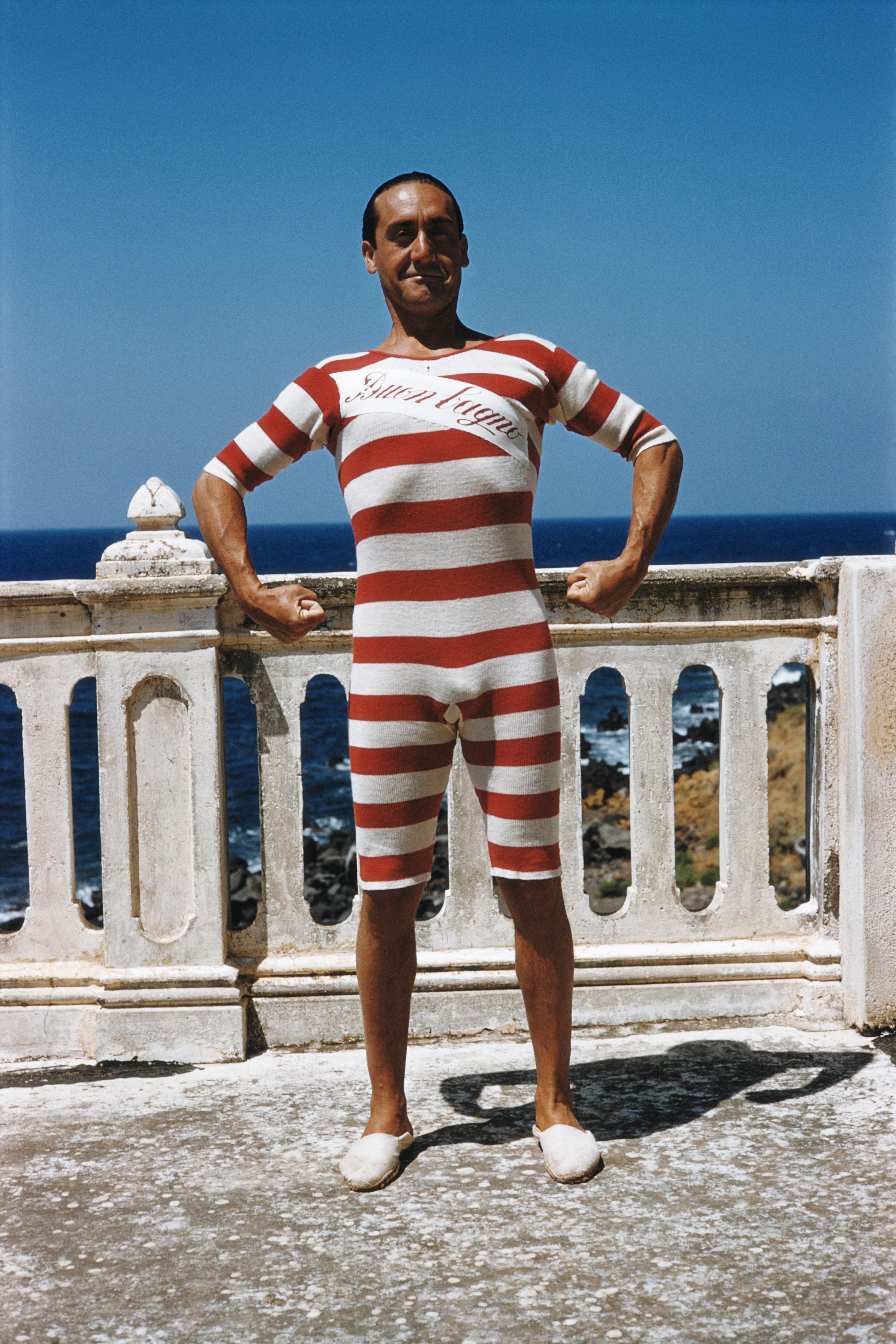 Slim Aarons
Professor Mario Sposito
1973
Chromogenic Lambda Print
Estate stamped and hand numbered edition of 150 with certificate of authenticity from the estate. 

Professor Mario Sposito wearing an old-fashioned red and white striped bathing
