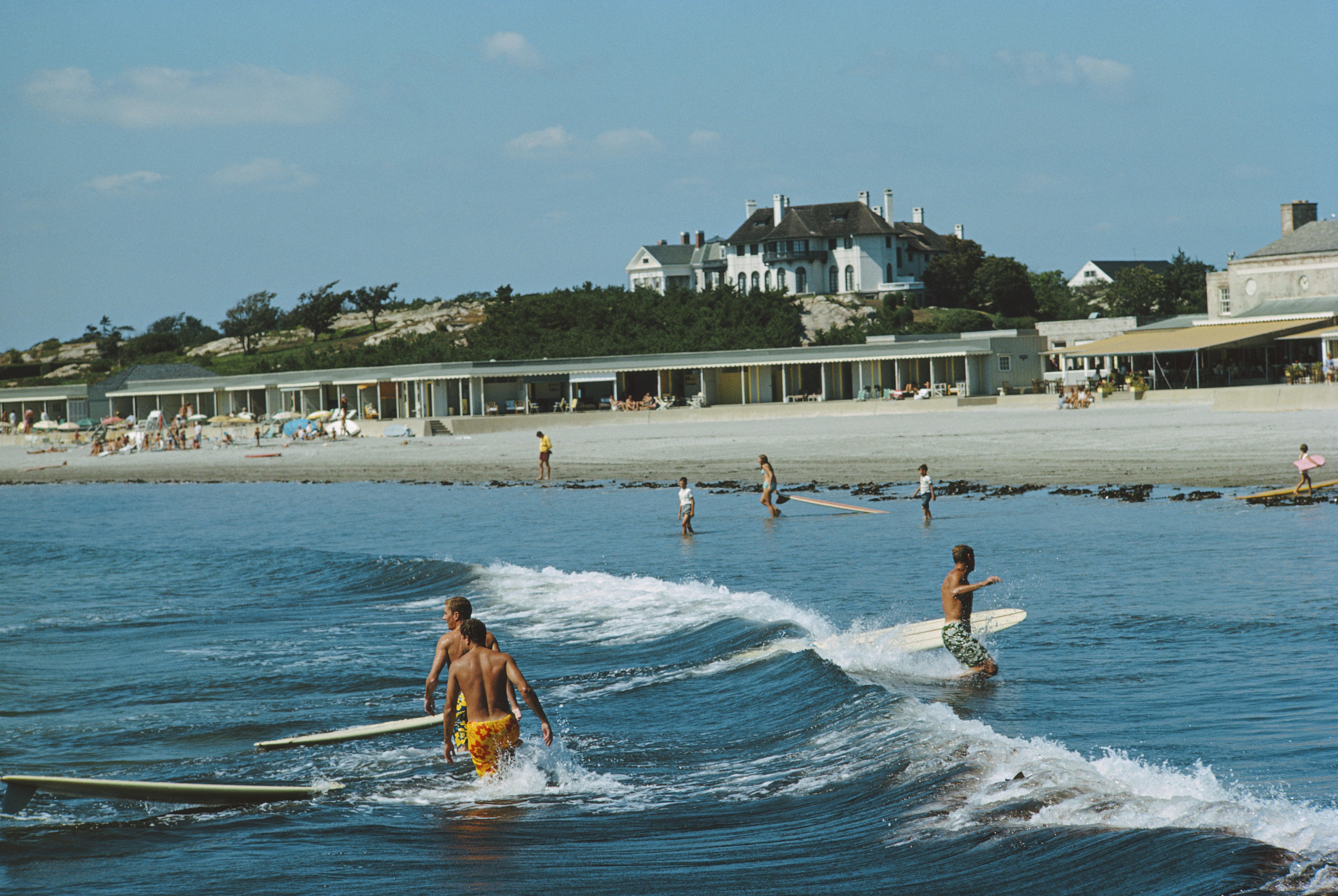 Rhode Island Surfers
1965
C print
Estate signature stamped and hand numbered edition of 150 with certificate of authenticity from the estate. 

Surfers of Rhode Island, September 1965. (Photo by Slim Aarons/Getty Images)

Slim Aarons, an acclaimed