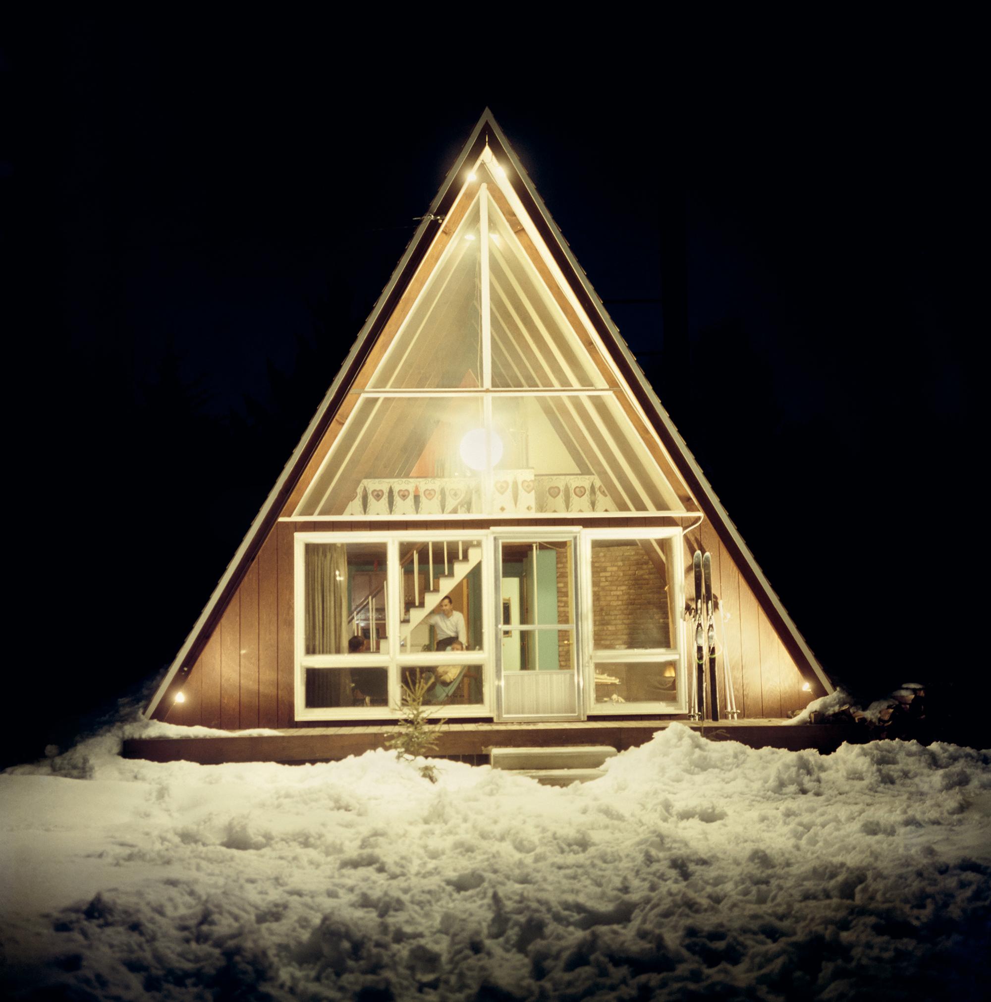 On The Slopes In Stowe
1962 (printed later)
C-print
Estate stamped and hand numbered edition of 150 with certificate of authenticity from the estate. 

Five people relaxing on the terrace of the glass-fronted triangular Skaal House in the Stowe