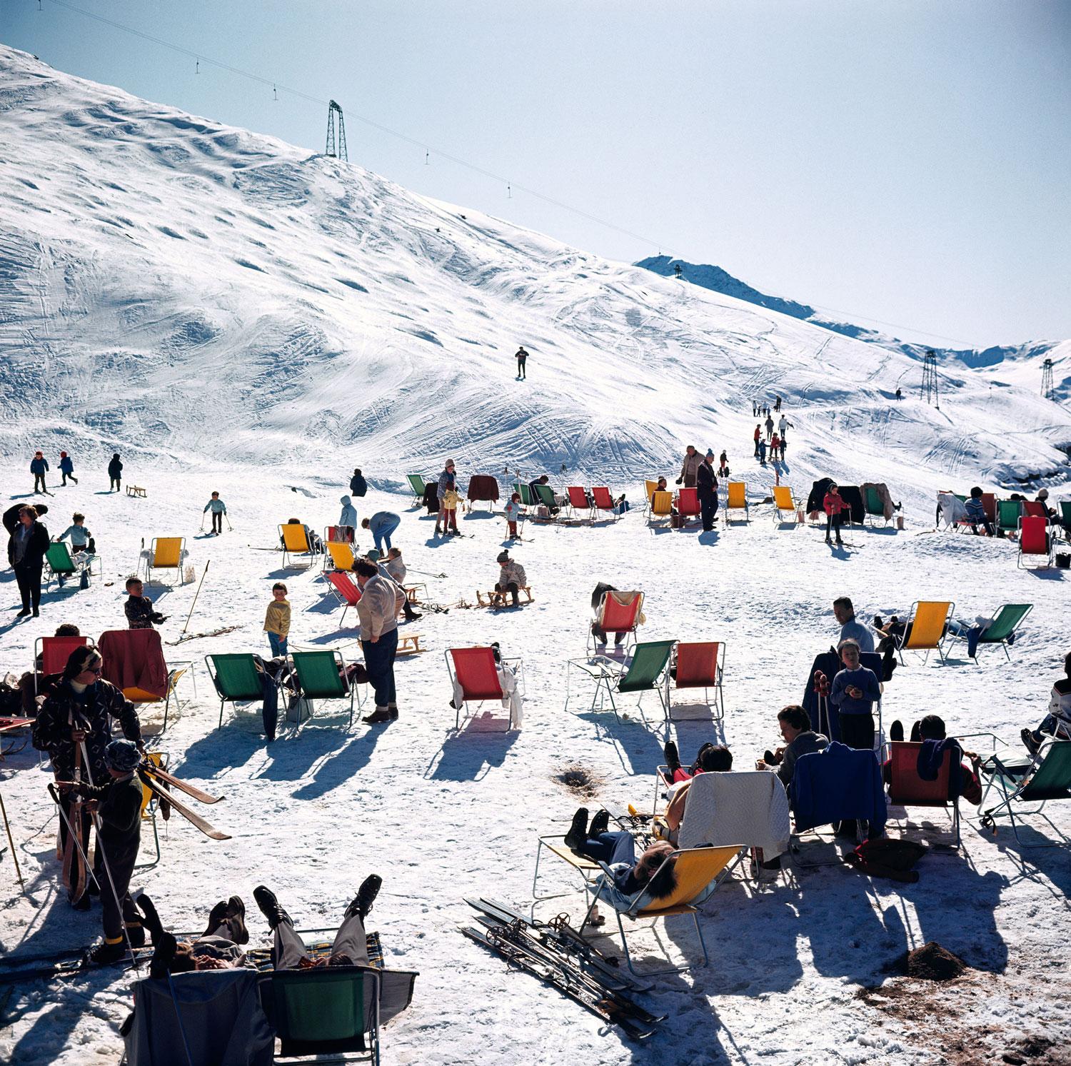 Skiers At Verbier
1964
C-Print
Estate signature stamped and hand numbered edition of 150 with certificate of authenticity from the estate.   

1964: Skiers relax in deckchairs on the slopes at Verbier in Switzerland. (Photo by Slim Aarons/Getty