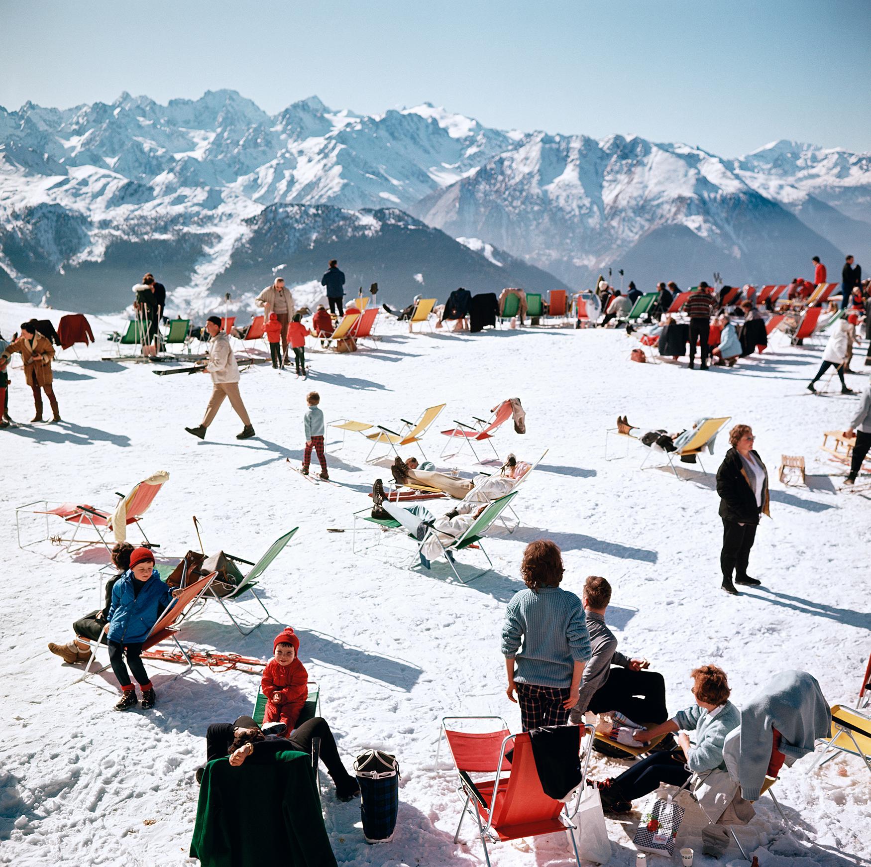 Verbier Vacation
1964
C-Print
Estate signature stamped and hand numbered edition of 150 with certificate of authenticity from the estate.   

Holiday-makers take the sun on a mountain top in Verbier, 1964. (Photo by Slim Aarons/Hulton Archive/Getty