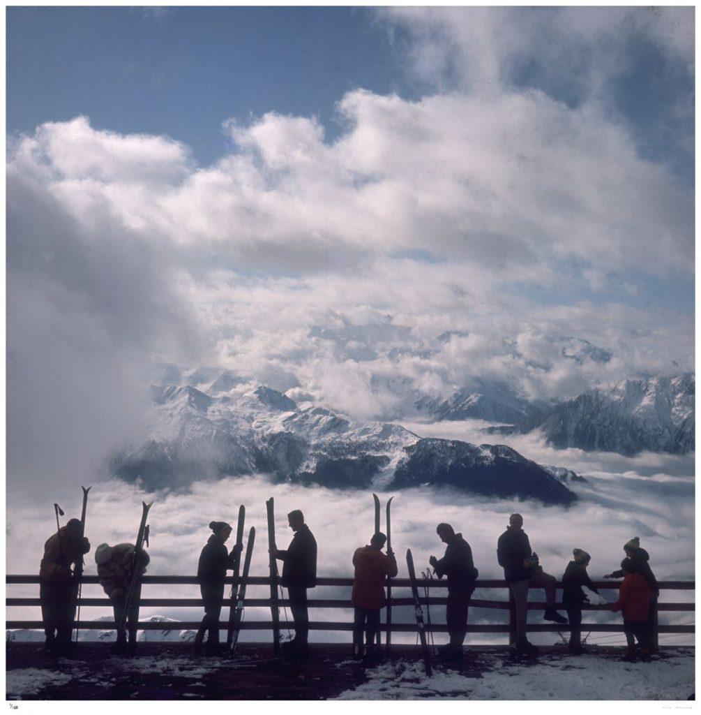 'Verbier View' by Slim Aarons

Skiers admire the view across a valley of clouds at Verbier, 1964. 

This photograph epitomises the travel style and glamour of the period's wealthy and famous, beautifully documented by Aarons.

In his words, he loved