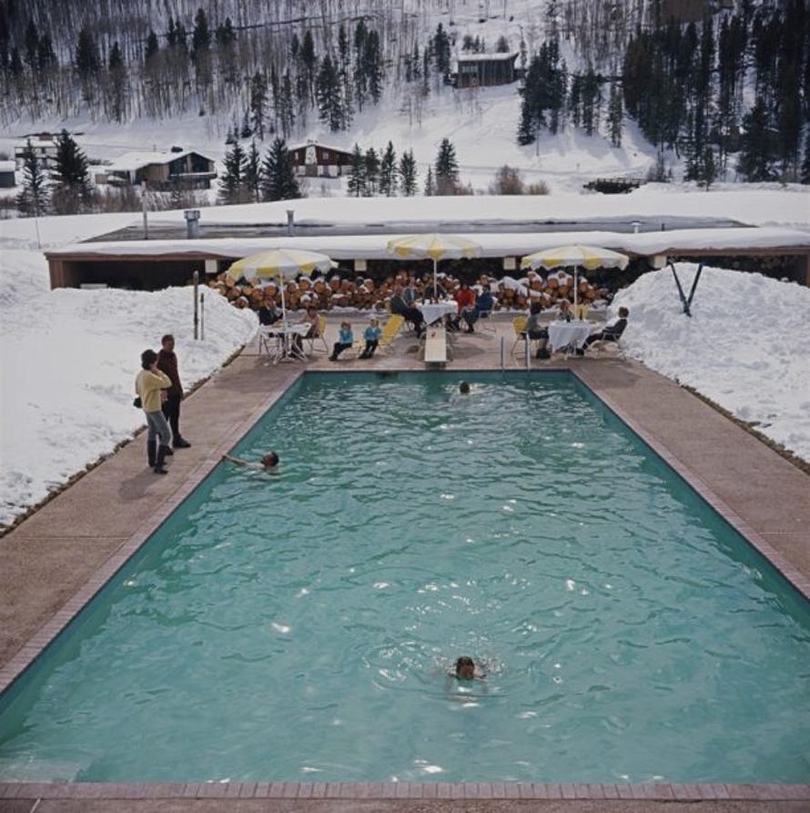 Snow Round the Pool 
1964
by Slim Aarons

Slim Aarons Limited Estate Edition

Bathers having a winter dip in a pool at Vail, Colorado, March 1964

unframed
c type print
printed 2023
16×16 inches - paper size


Limited to 150 prints only – regardless