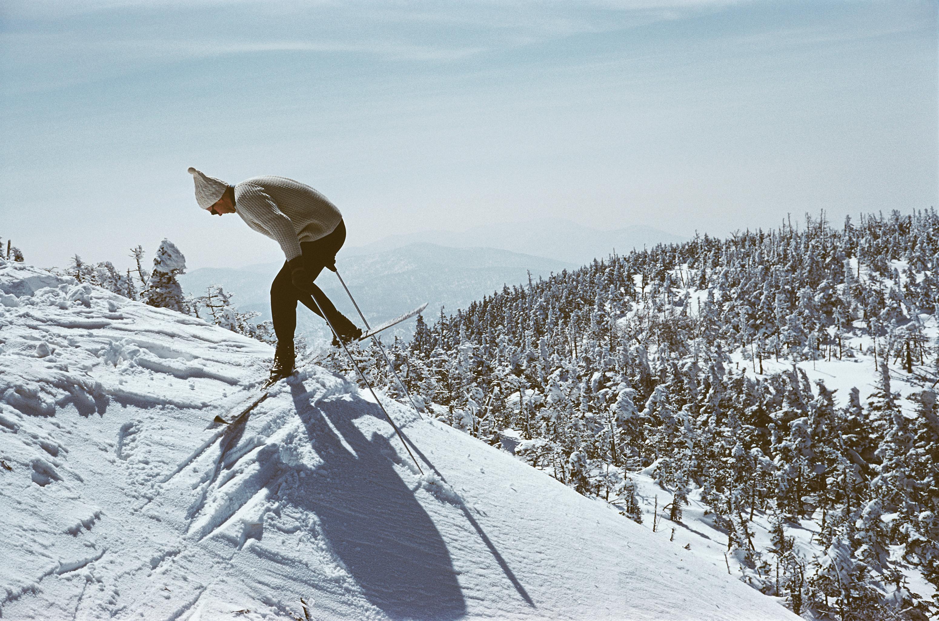 This 1660 winter landscape photograph, captured by society photographer Slim Aarons, features an individual skiing at Sugarbush, a mountain resort in Vermont, April 1960.

This is an estate stamped and hand numbered edition of 150 with certificate