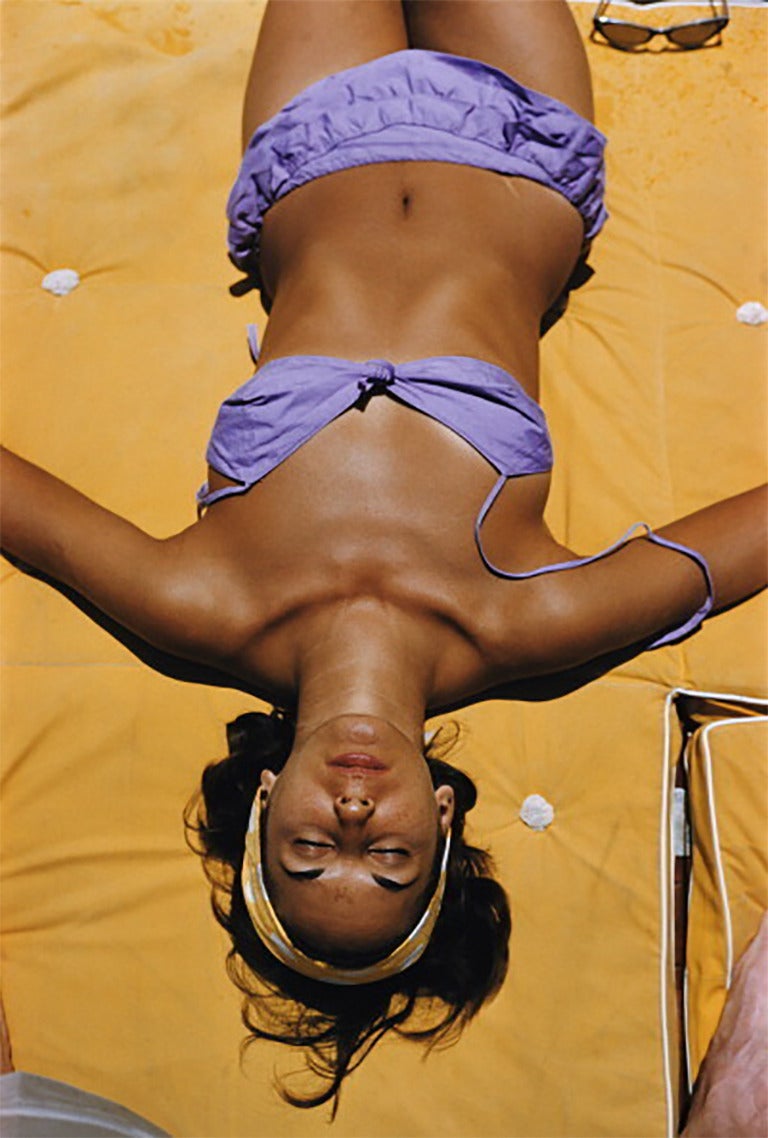 Sun Worship
1958
C print
Estate stamped and hand numbered edition of 150 with certificate of authenticity from the estate. 

Bianca Volpato sunning herself at Capri in a lilac coloured bikini.

Slim Aarons (1916-2006) worked mainly for society