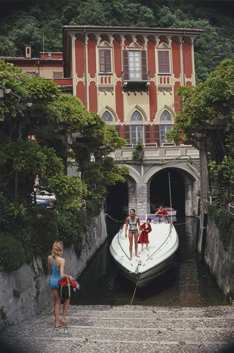Tullio Abbate 
1983
by Slim Aarons

Slim Aarons Limited Estate Edition

 Tullio Abbate, of Abbate Boats, at the back of yacht as it is moored at a property on the shores of Lake Como, Italy, in June 1983.

unframed
c type print
printed 2023
20 × 16