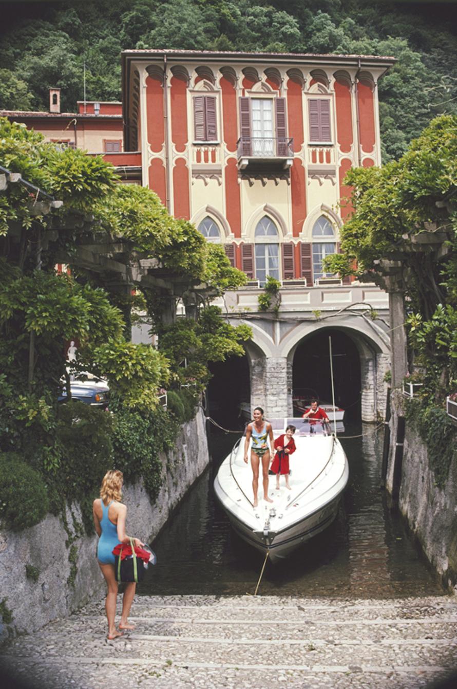 Tullio Abbate 
1983
by Slim Aarons

Slim Aarons Limited Estate Edition

Tullio Abbate, of Abbate Boats, at the back of yacht as it is moored at a property on the shores of Lake Como, Italy, in June 1983.

unframed
c type print
printed 2023
24 x 20" 