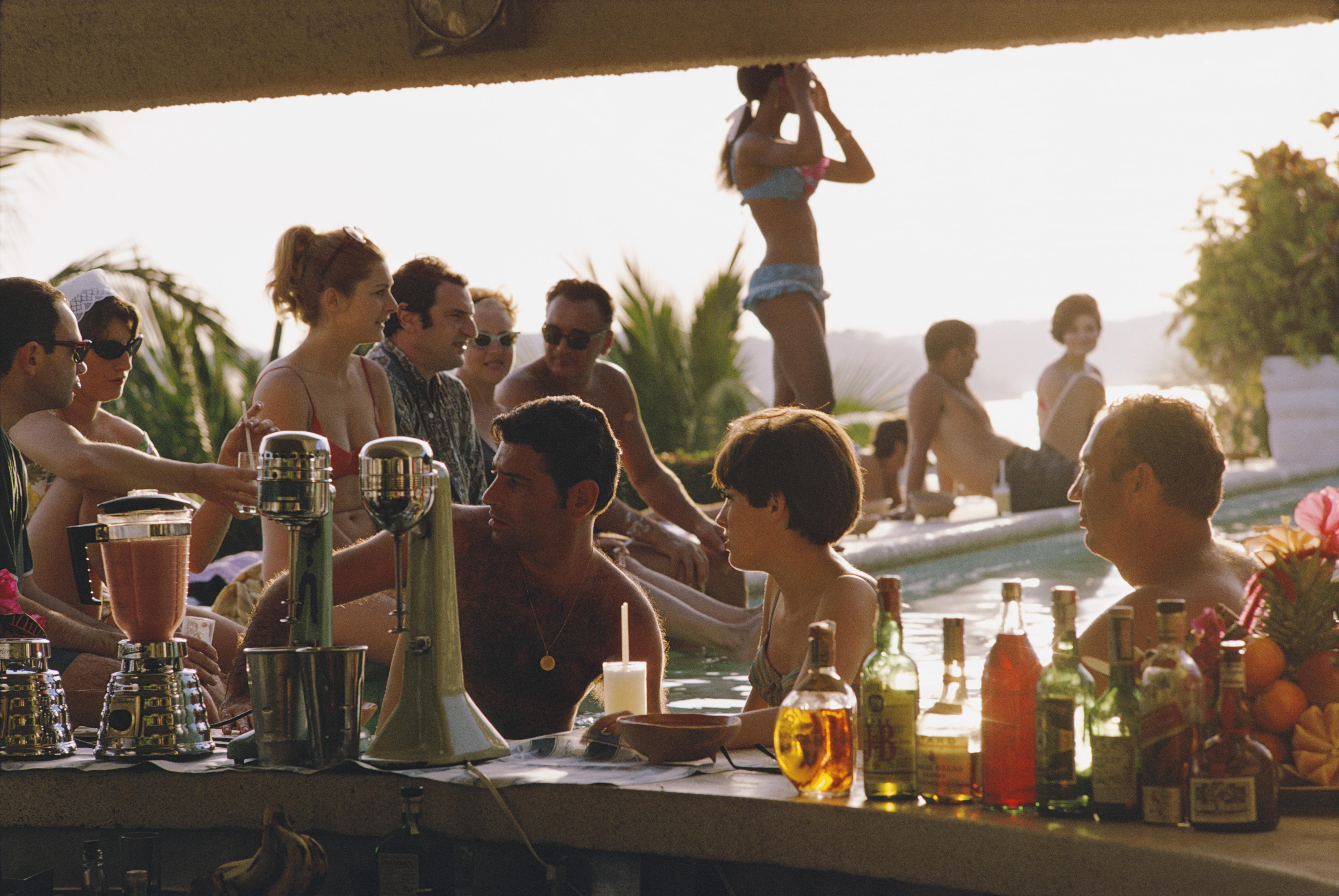 'Vila Vera' 1968 Slim Aarons Limited Estate Edition

The bar at the Villa Vera Hotel Spa and Racquet Club in Acapulco, January 1968. 

Produced from the original transparency
Certificate of authenticity supplied 
30x40 inches / 76 x 102 cm paper