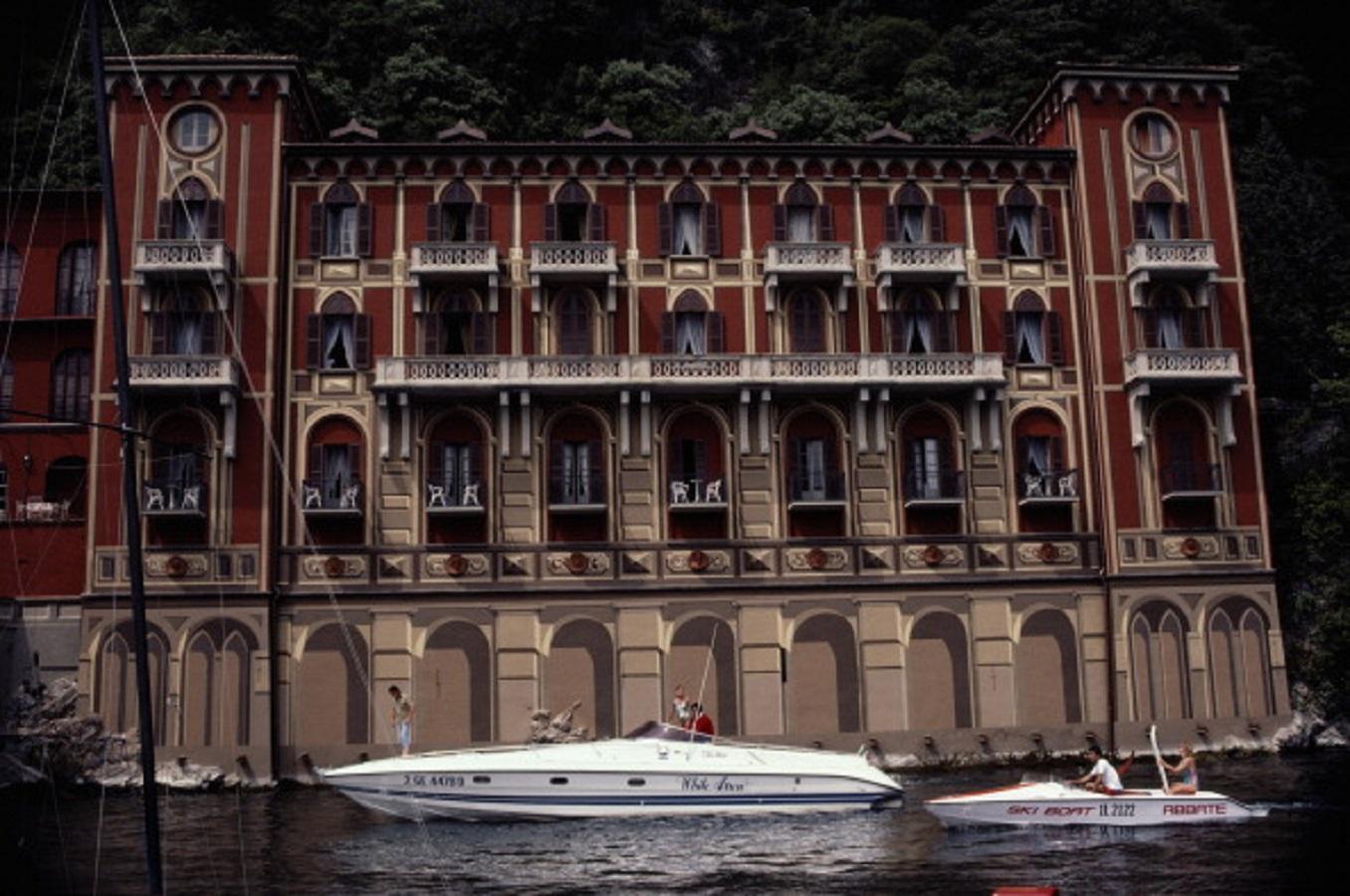 'Villa D'Este' 1983 Slim Aarons Limited Estate Edition Print 

Boats on the waters near the Queen's Pavilion, the east wing of the Villa d'Este, on Lake Como, in Cernobbio, Italy, in June 1983.

Produced from the original transparency
Certificate of