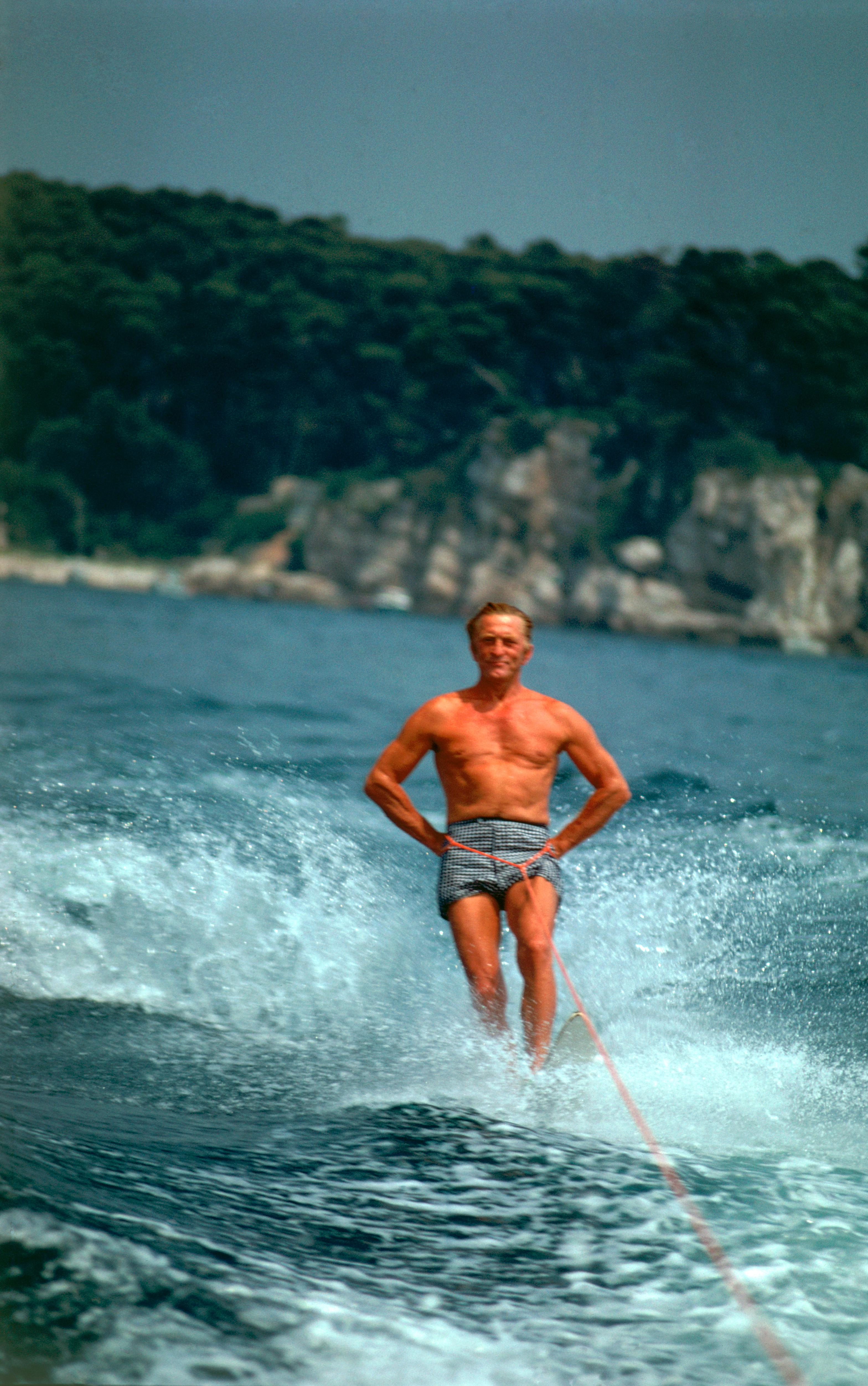 Slim Aarons Nude Photograph - Waterskiing Star: Kirk Douglas, Hôtel du Cap Eden-Roc, Estate Edition Photograph