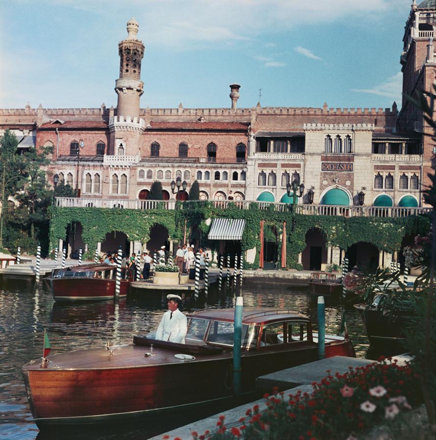Westin Excelsior 
1957
by Slim Aarons

Slim Aarons Limited Estate Edition

The Westin Excelsior Hotel on the Lido in Venice, 1957.

unframed
c type print
printed 2023
16 × 16 inches - paper size


Limited to 150 prints only – regardless of paper