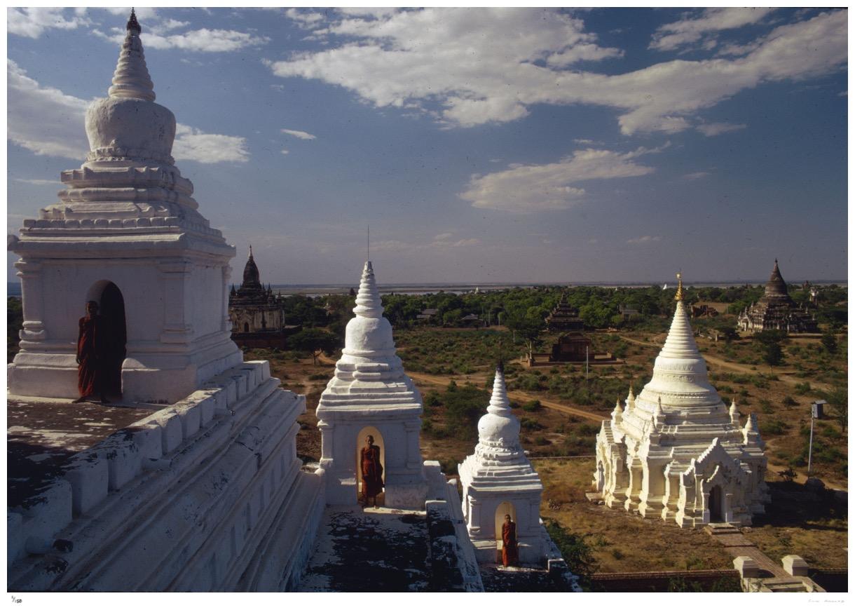 White Pagoda 1970 - Slim Aarons

In 1044 AD building of some 15,000 pagodas, temples and palaces started on a sixteen square mile site at Pagan, Burma. Today about 5,00 still remain of which this white pagoda, Ananda, built in 1091, is one, circa