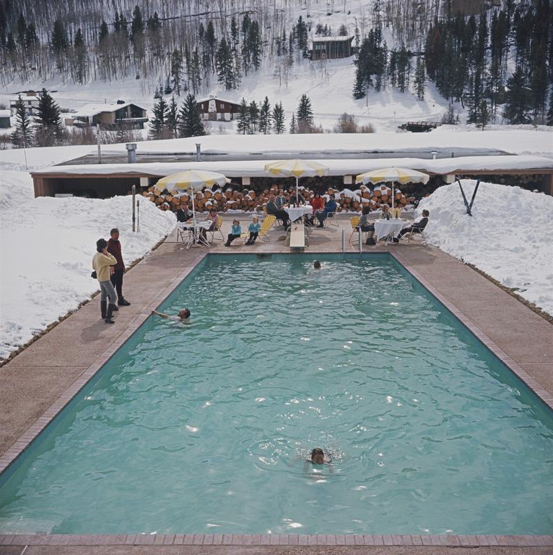 Slim Aarons Color Photograph - Winter Pool (1964) Limited Estate Stamped - Grande XL