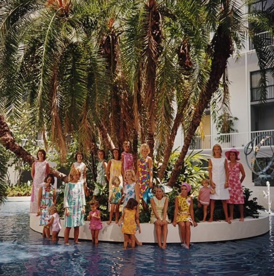 Young Society 
1964
by Slim Aarons

Slim Aarons Limited Estate Edition

Young matrons of Palm Beach, Florida. Most of them are wearing a gaily coloured Lilly Pulitzer shift, April 1964.

unframed
c type print
printed 2023
16×16 inches - paper
